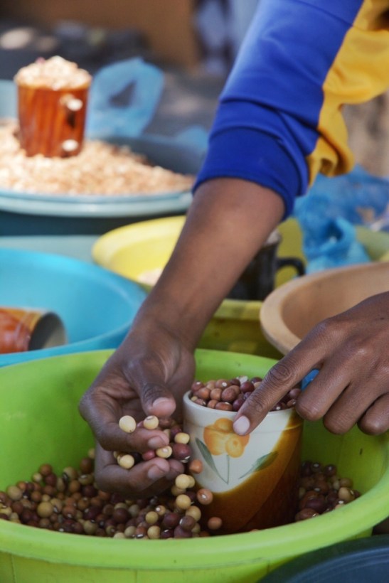 A variety of dried beans for sale at a street stall in Gaborone.